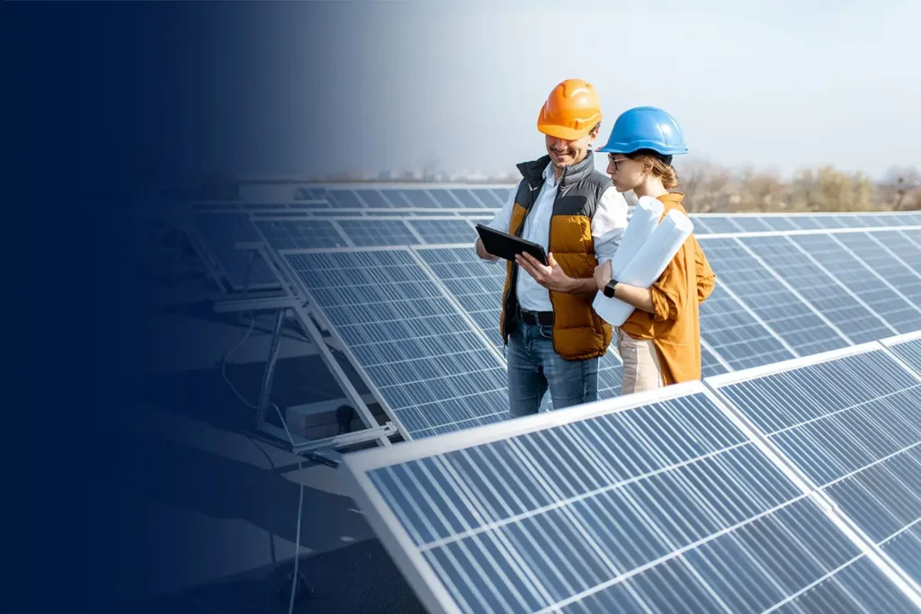 A solar panel installer in Houston inspecting newly installed panels for optimal performance
